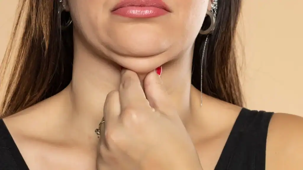 An image of a woman with double chin, sad, worried : Non Surgical Double Chin Removal Treatment in Inverness, UK